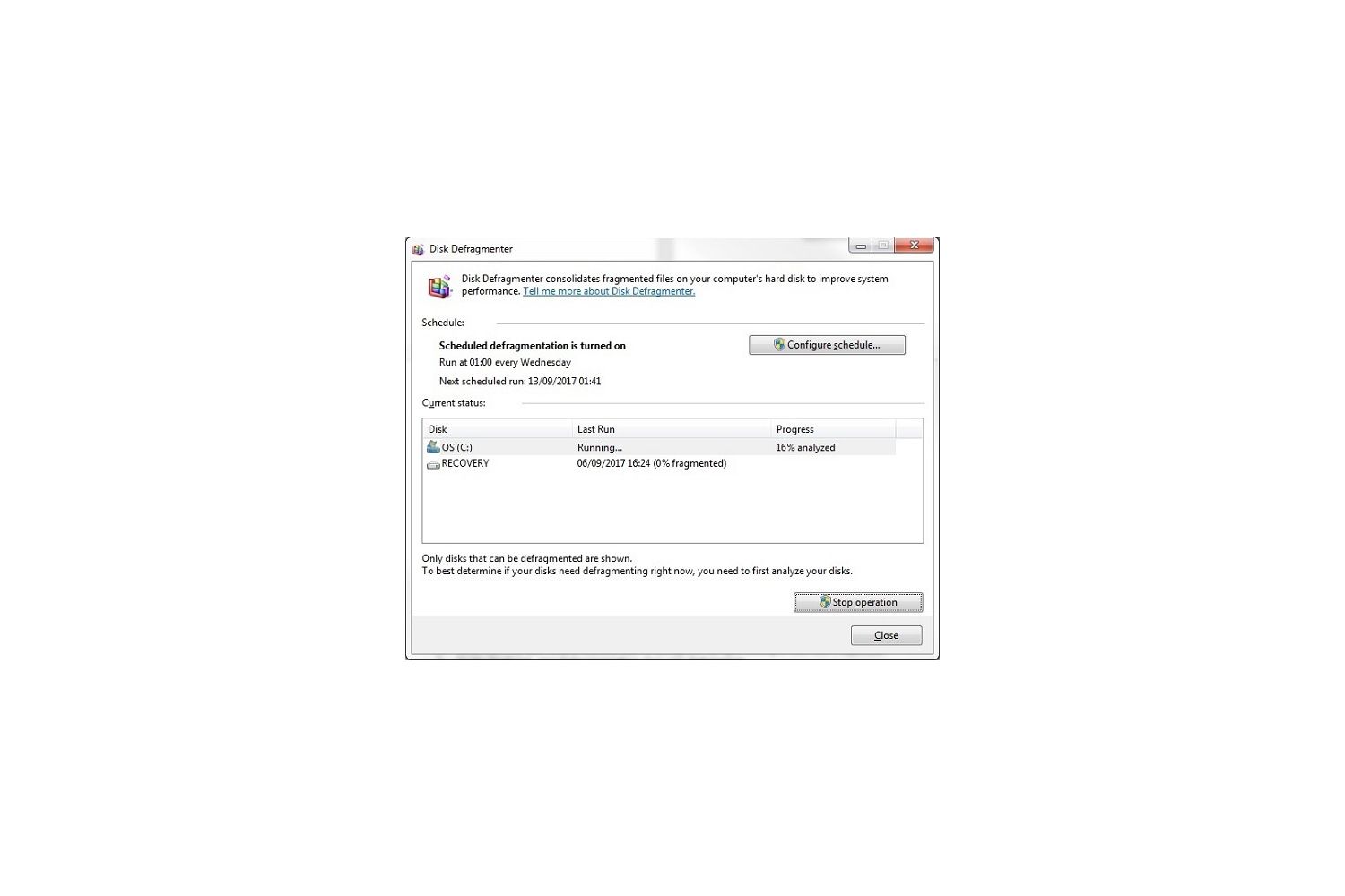 Windows 7ディスクデフラグツールのポップアップウィンドウに表示されたディスク分析レポートの現在の分析状況